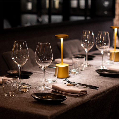 Place setting with elegant tableware and glassware for dining experience